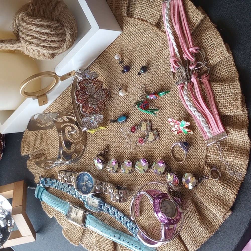 Bag of watches and cuffs and jewelry